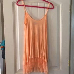 Peach tank with lace frilly bottom